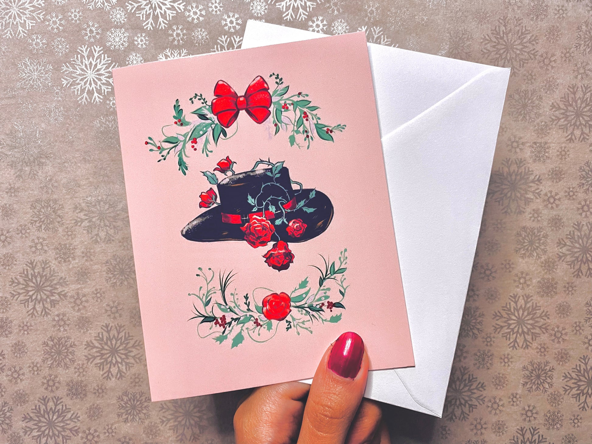 The red rose cowgirl hat illustration on a Christmas card