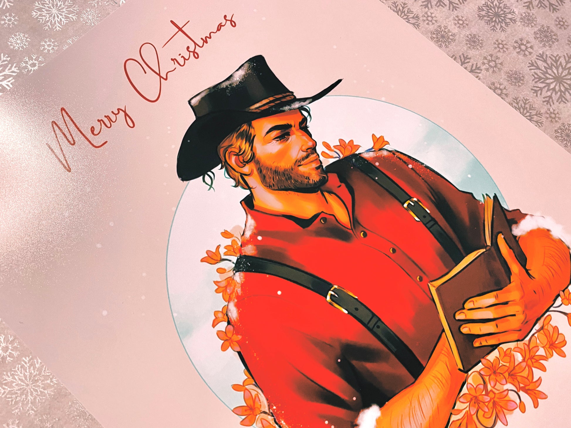 Festive cowboy art print, dressed in read and covered in snow