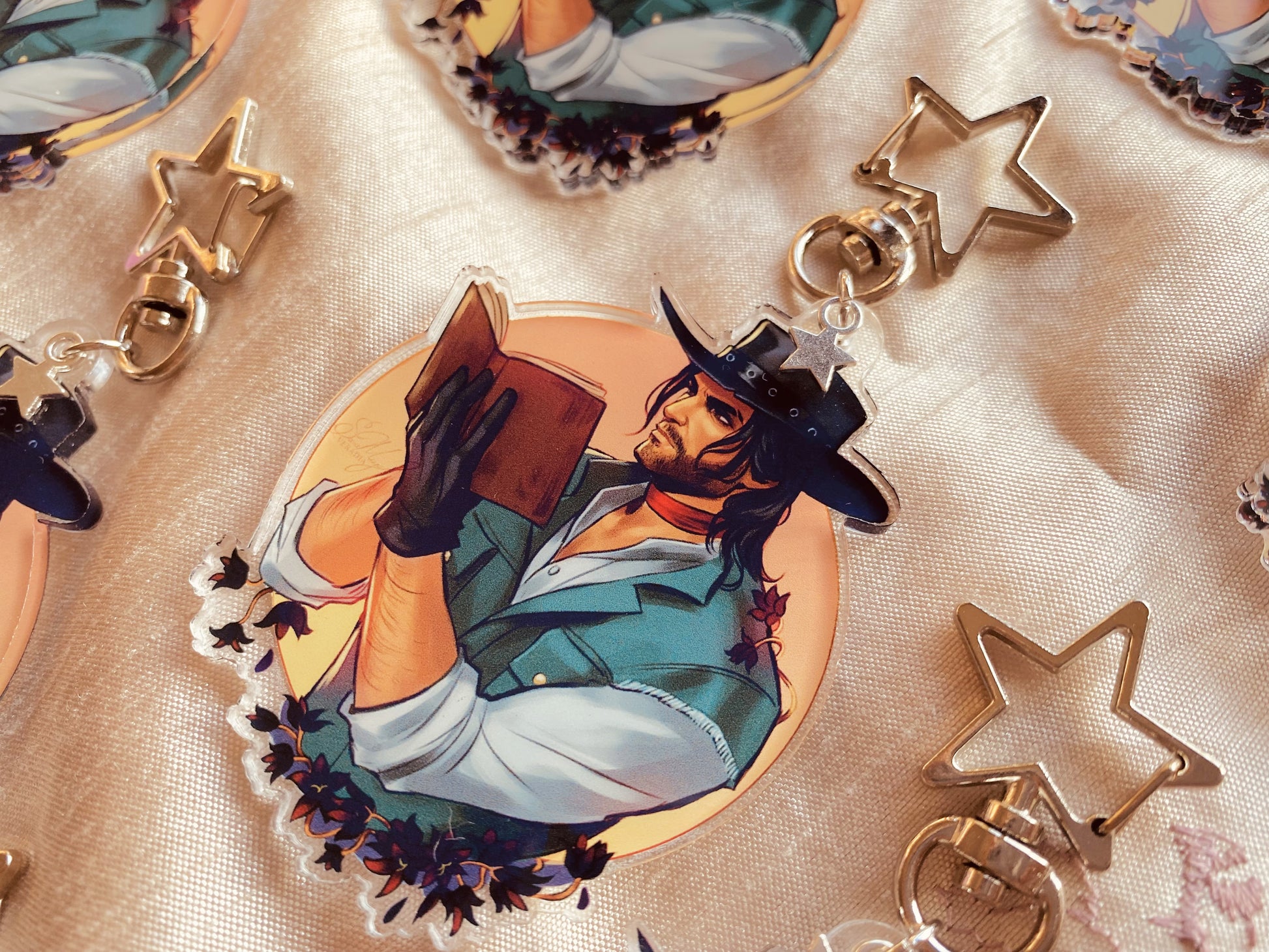 cowboy charms with lilies, made from acrylic and using digital art